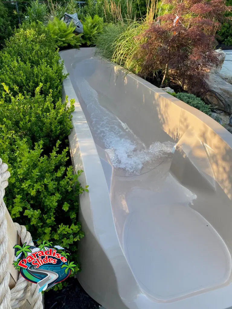 Pool Slide, Water Slide, Natural Stone and Grotto, custom home pool slide
